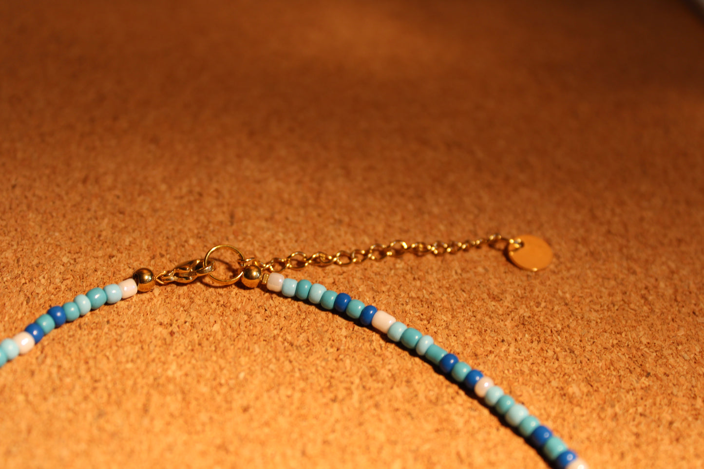 Collana di perle boho con pendente a conchiglia di ciprea